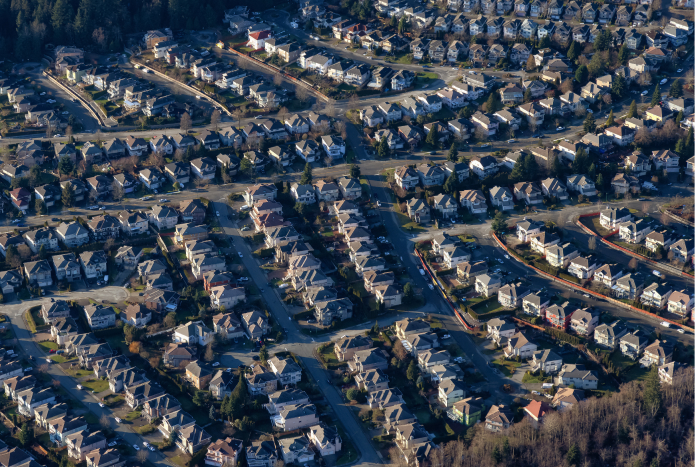 aerial view of crammed neighborhood with hundreds of homes