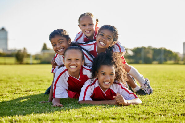 young soccer team smiling for a picture