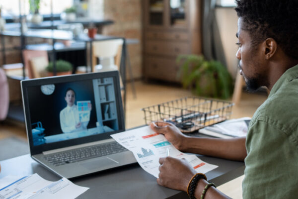 Two workers on a virtual conference call